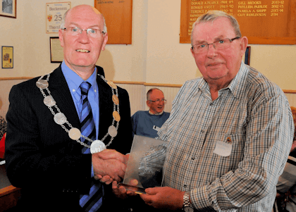 Colin Evans of the Lions Club receiving the award.