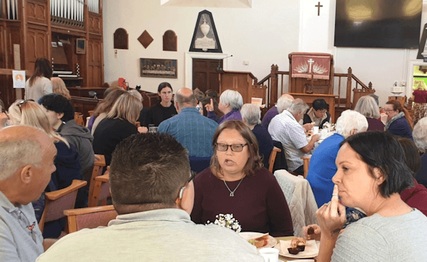 Guests at the volunteer lunch in the United Reform Church.